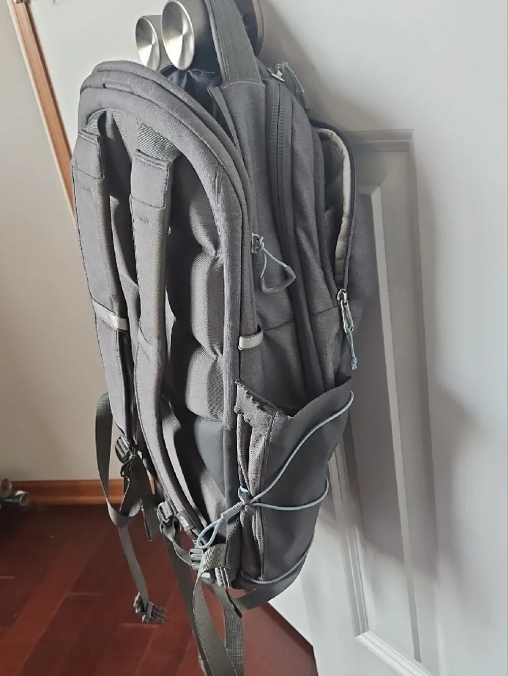 The North Face Grey Backpack with Light Blue Bungee Cord